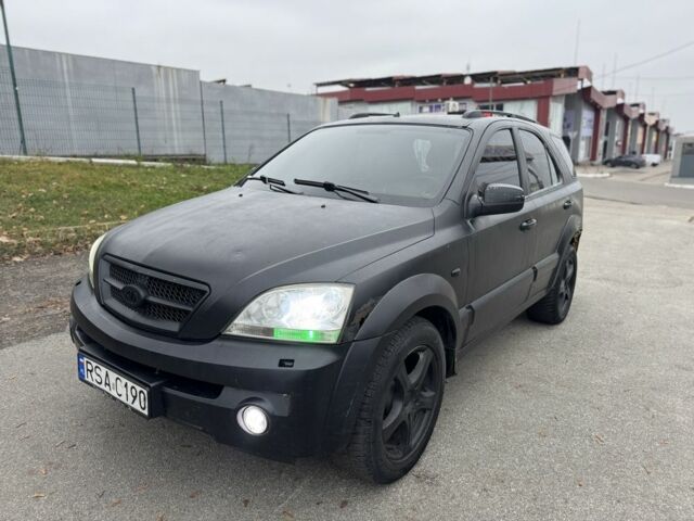 Чорний Кіа Соренто, об'ємом двигуна 2.5 л та пробігом 285 тис. км за 2950 $, фото 1 на Automoto.ua