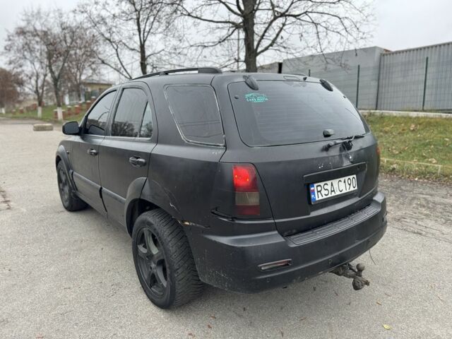 Чорний Кіа Соренто, об'ємом двигуна 2.5 л та пробігом 285 тис. км за 2950 $, фото 2 на Automoto.ua