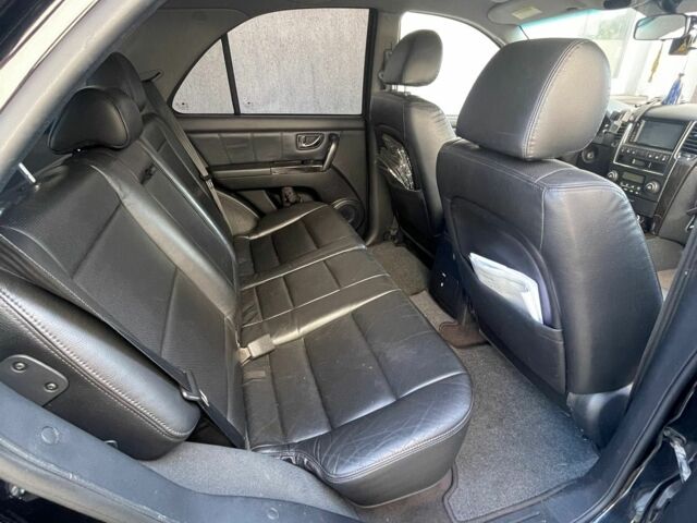 Черный Киа Соренто, объемом двигателя 2.5 л и пробегом 220 тыс. км за 6000 $, фото 2 на Automoto.ua