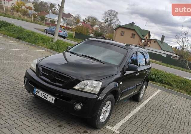 Черный Киа Соренто, объемом двигателя 2.5 л и пробегом 240 тыс. км за 7500 $, фото 2 на Automoto.ua
