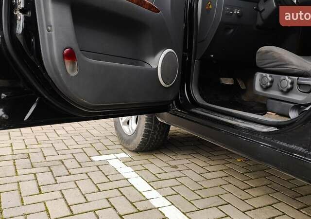 Черный Киа Соренто, объемом двигателя 2.5 л и пробегом 240 тыс. км за 7500 $, фото 16 на Automoto.ua