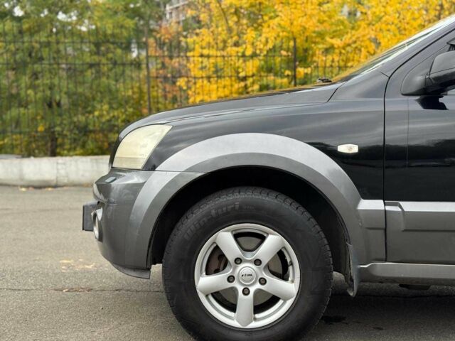 Черный Киа Соренто, объемом двигателя 2.5 л и пробегом 303 тыс. км за 6990 $, фото 4 на Automoto.ua