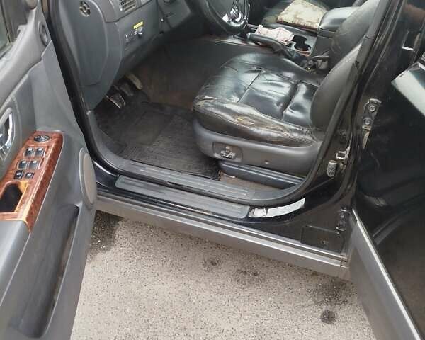 Чорний Кіа Соренто, об'ємом двигуна 2.5 л та пробігом 390 тис. км за 5000 $, фото 7 на Automoto.ua