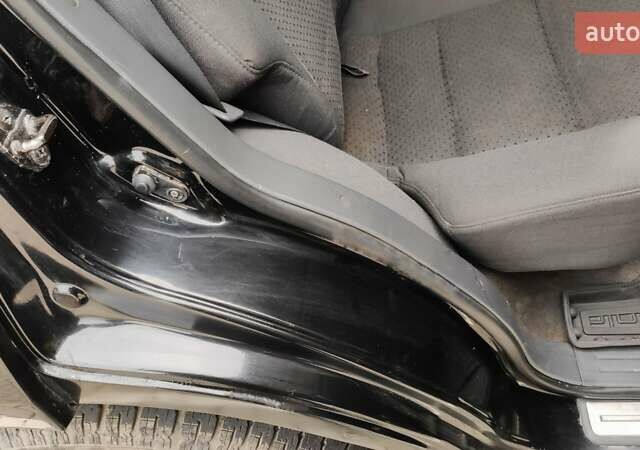 Черный Киа Соренто, объемом двигателя 2.5 л и пробегом 240 тыс. км за 7500 $, фото 18 на Automoto.ua