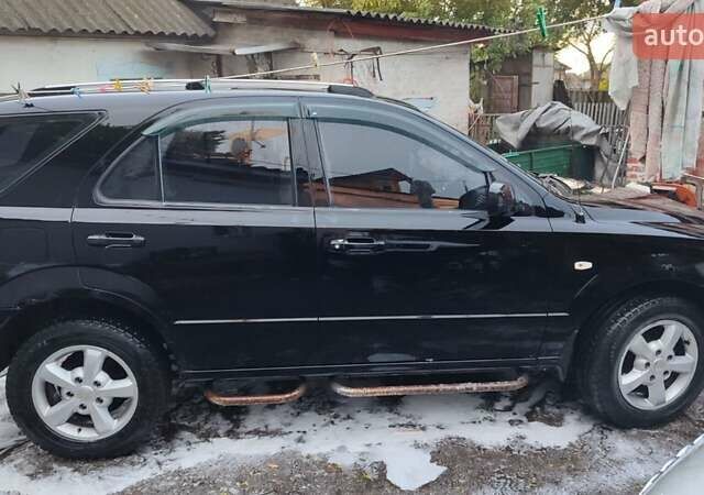 Черный Киа Соренто, объемом двигателя 2.5 л и пробегом 313 тыс. км за 6100 $, фото 7 на Automoto.ua