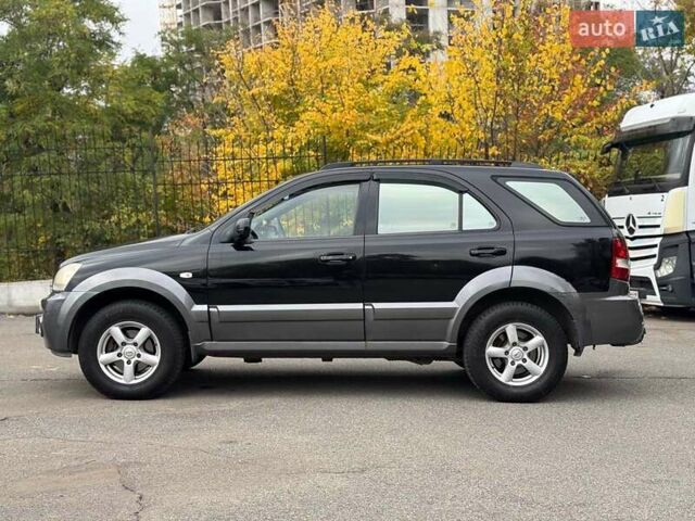 Чорний Кіа Соренто, об'ємом двигуна 2.5 л та пробігом 303 тис. км за 7490 $, фото 5 на Automoto.ua