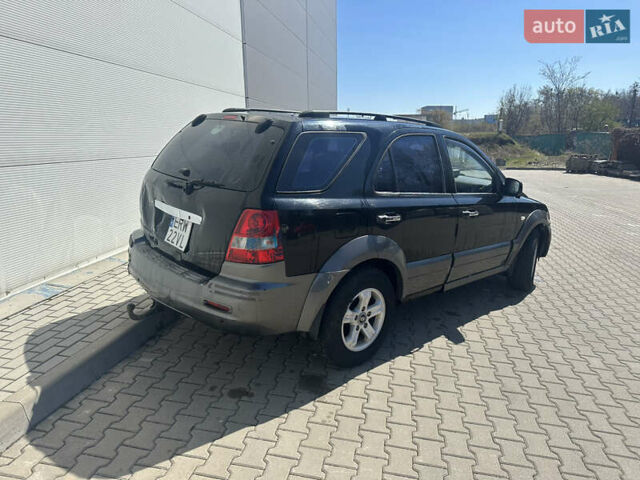 Чорний Кіа Соренто, об'ємом двигуна 2.5 л та пробігом 400 тис. км за 3900 $, фото 11 на Automoto.ua