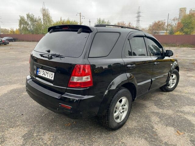 Чорний Кіа Соренто, об'ємом двигуна 2.5 л та пробігом 231 тис. км за 6999 $, фото 4 на Automoto.ua