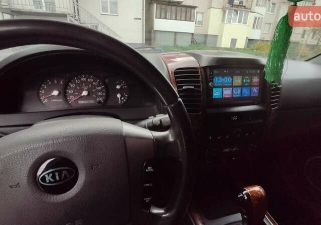 Черный Киа Соренто, объемом двигателя 2.5 л и пробегом 240 тыс. км за 7500 $, фото 10 на Automoto.ua