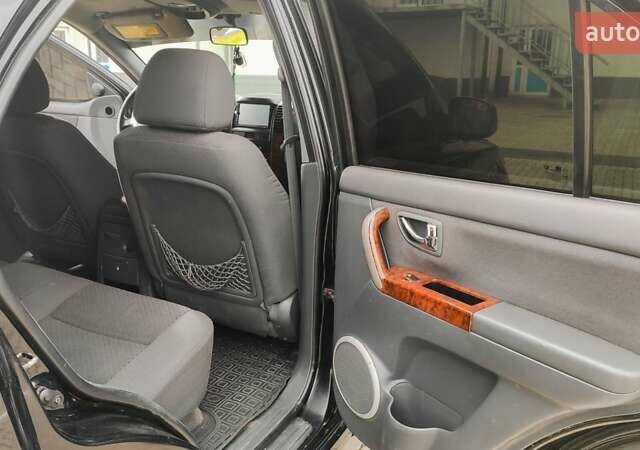 Черный Киа Соренто, объемом двигателя 2.5 л и пробегом 240 тыс. км за 7500 $, фото 14 на Automoto.ua