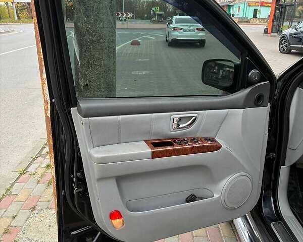 Чорний Кіа Соренто, об'ємом двигуна 2.35 л та пробігом 210 тис. км за 6500 $, фото 2 на Automoto.ua