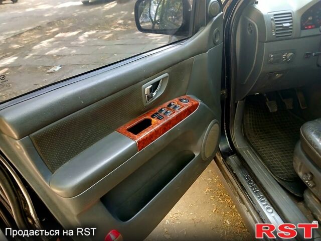 Чорний Кіа Соренто, об'ємом двигуна 2.5 л та пробігом 180 тис. км за 6500 $, фото 4 на Automoto.ua