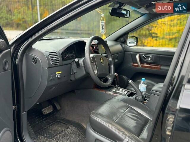 Чорний Кіа Соренто, об'ємом двигуна 2.5 л та пробігом 303 тис. км за 7490 $, фото 16 на Automoto.ua