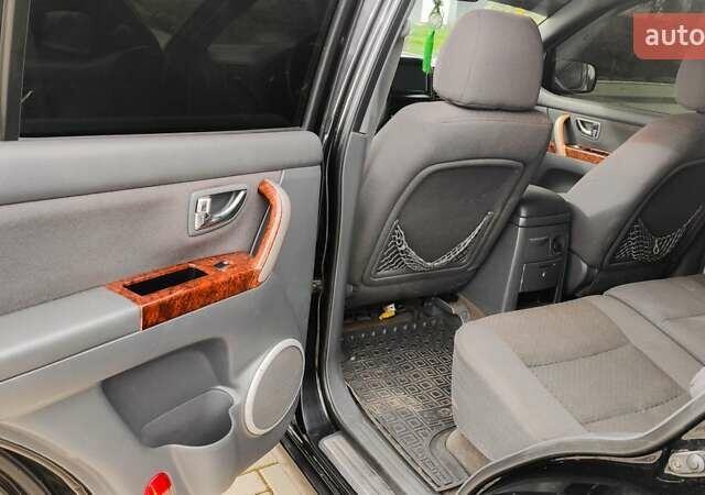 Черный Киа Соренто, объемом двигателя 2.5 л и пробегом 240 тыс. км за 7500 $, фото 13 на Automoto.ua