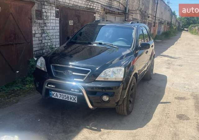 Черный Киа Соренто, объемом двигателя 2.5 л и пробегом 300 тыс. км за 7400 $, фото 2 на Automoto.ua