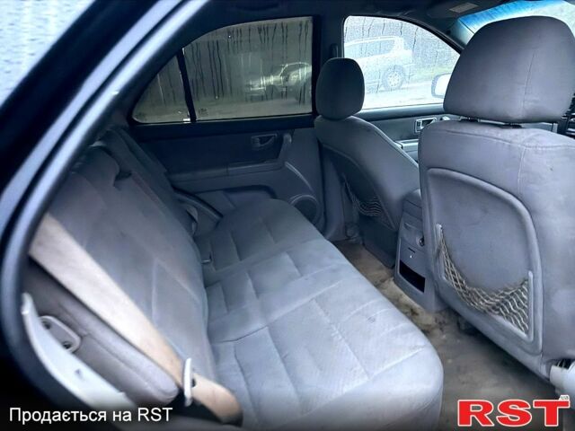 Чорний Кіа Соренто, об'ємом двигуна 2.5 л та пробігом 266 тис. км за 3000 $, фото 8 на Automoto.ua