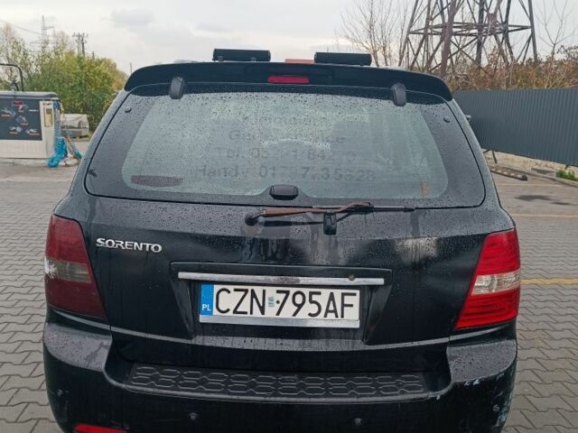 Черный Киа Соренто, объемом двигателя 3.5 л и пробегом 327 тыс. км за 3400 $, фото 2 на Automoto.ua