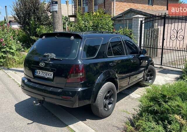Черный Киа Соренто, объемом двигателя 2.5 л и пробегом 300 тыс. км за 7400 $, фото 3 на Automoto.ua