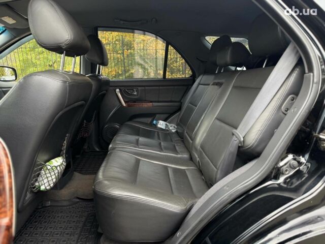 Чорний Кіа Соренто, об'ємом двигуна 2.5 л та пробігом 303 тис. км за 7490 $, фото 29 на Automoto.ua