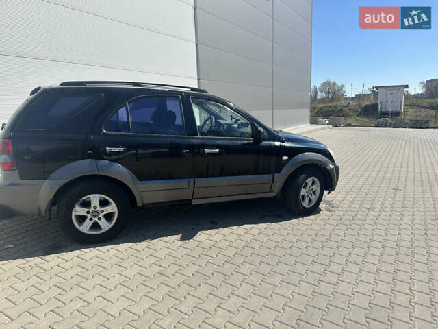 Чорний Кіа Соренто, об'ємом двигуна 2.5 л та пробігом 400 тис. км за 3900 $, фото 9 на Automoto.ua