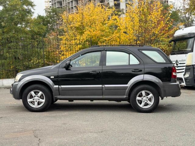 Черный Киа Соренто, объемом двигателя 2.5 л и пробегом 303 тыс. км за 6990 $, фото 5 на Automoto.ua