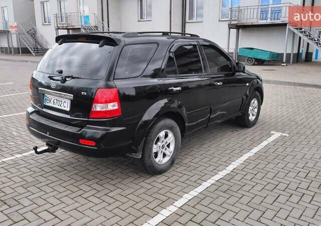 Черный Киа Соренто, объемом двигателя 2.5 л и пробегом 240 тыс. км за 7500 $, фото 5 на Automoto.ua