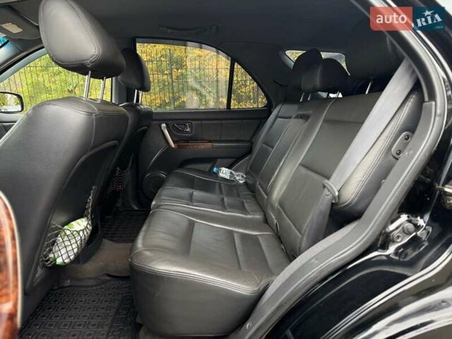 Чорний Кіа Соренто, об'ємом двигуна 2.5 л та пробігом 303 тис. км за 7490 $, фото 29 на Automoto.ua