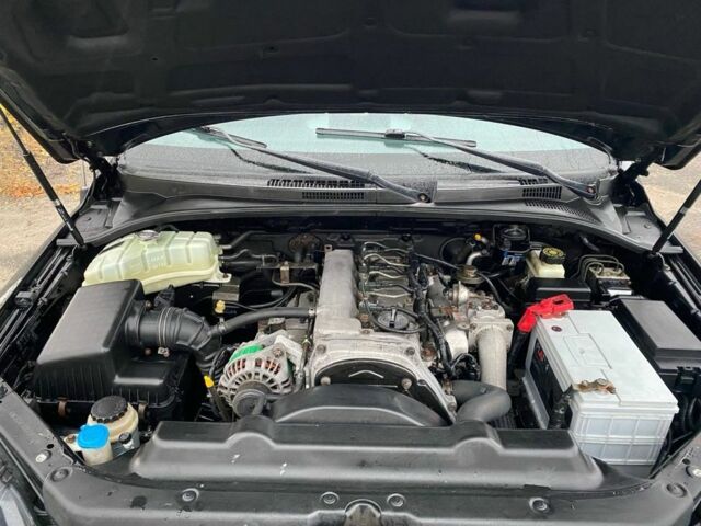 Чорний Кіа Соренто, об'ємом двигуна 2.5 л та пробігом 231 тис. км за 6999 $, фото 12 на Automoto.ua