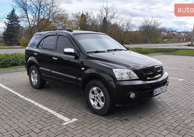Черный Киа Соренто, объемом двигателя 2.5 л и пробегом 240 тыс. км за 7500 $, фото 3 на Automoto.ua