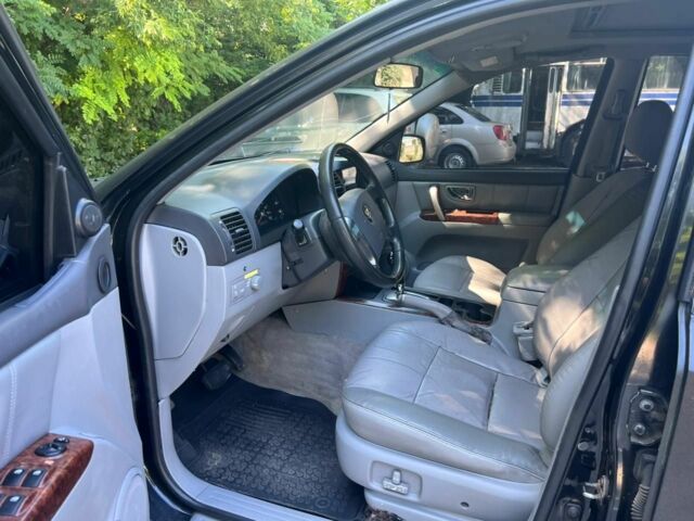 Черный Киа Соренто, объемом двигателя 2.5 л и пробегом 400 тыс. км за 5500 $, фото 7 на Automoto.ua