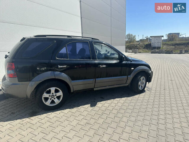Чорний Кіа Соренто, об'ємом двигуна 2.5 л та пробігом 400 тис. км за 3900 $, фото 10 на Automoto.ua