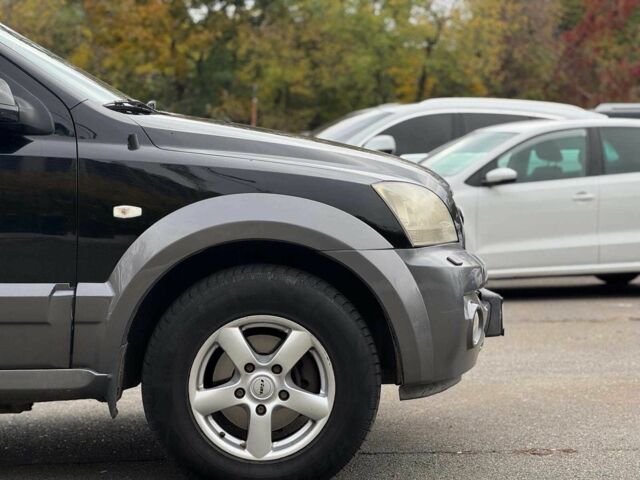 Черный Киа Соренто, объемом двигателя 2.5 л и пробегом 303 тыс. км за 6990 $, фото 13 на Automoto.ua