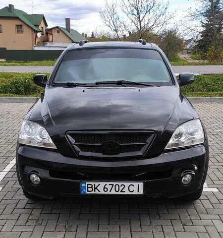 Черный Киа Соренто, объемом двигателя 2.5 л и пробегом 240 тыс. км за 7500 $, фото 6 на Automoto.ua