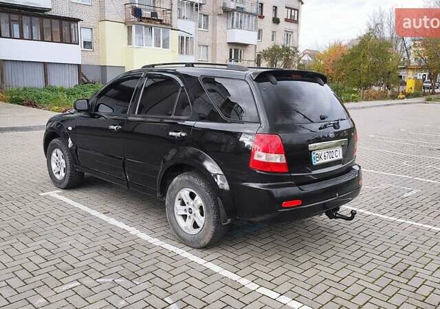 Черный Киа Соренто, объемом двигателя 2.5 л и пробегом 240 тыс. км за 7500 $, фото 4 на Automoto.ua