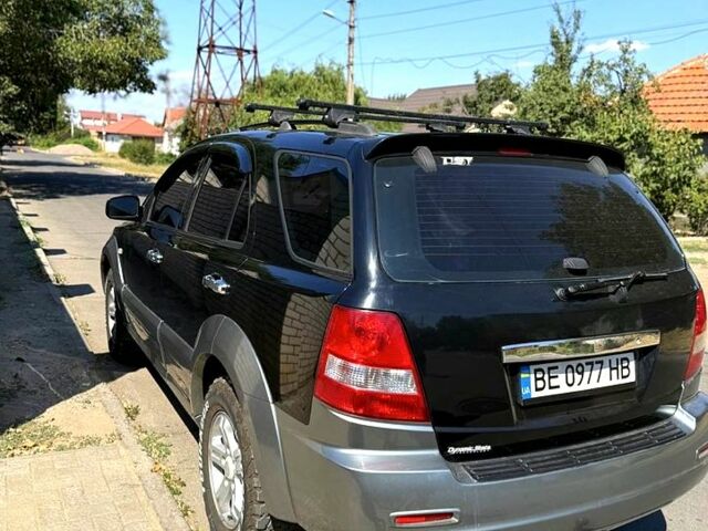 Черный Киа Соренто, объемом двигателя 2.4 л и пробегом 240 тыс. км за 5500 $, фото 1 на Automoto.ua