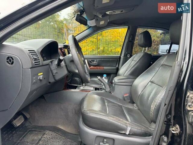 Чорний Кіа Соренто, об'ємом двигуна 2.5 л та пробігом 303 тис. км за 7490 $, фото 20 на Automoto.ua