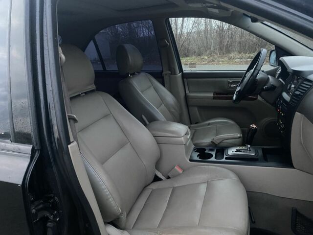 Черный Киа Соренто, объемом двигателя 2.5 л и пробегом 250 тыс. км за 4150 $, фото 11 на Automoto.ua