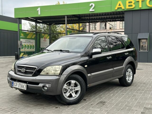 Черный Киа Соренто, объемом двигателя 2.5 л и пробегом 218 тыс. км за 4500 $, фото 16 на Automoto.ua