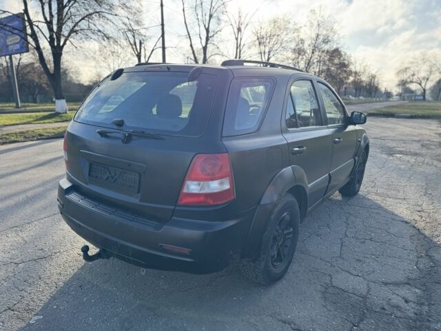 Черный Киа Соренто, объемом двигателя 2.5 л и пробегом 285 тыс. км за 3300 $, фото 4 на Automoto.ua