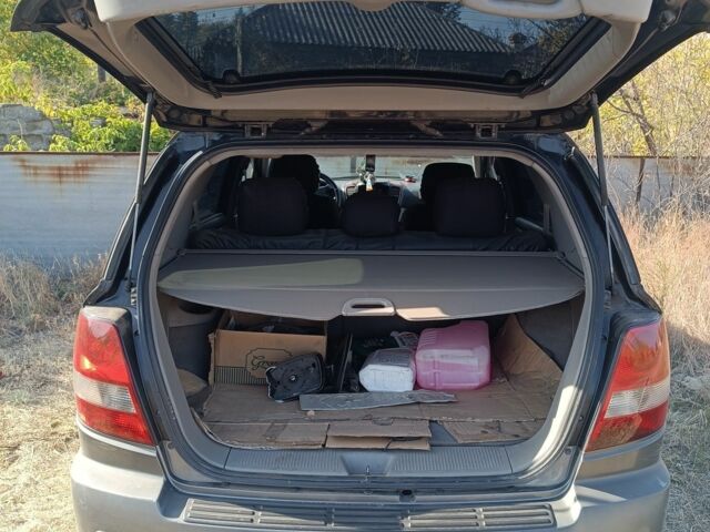 Киа Соренто 2004 в Изюме на Automoto.ua Черный Киа Соренто, объемом двигателя 2.5 л и пробегом 300 тыс. км за 5500 $, фото 3 на Automoto.ua