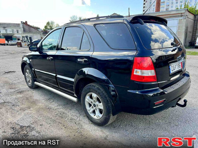 Черный Киа Соренто, объемом двигателя 2.5 л и пробегом 304 тыс. км за 3800 $, фото 2 на Automoto.ua