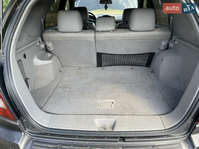 Чорний Кіа Соренто, об'ємом двигуна 2.5 л та пробігом 345 тис. км за 5100 $, фото 20 на Automoto.ua