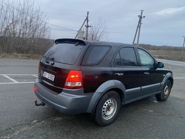 Черный Киа Соренто, объемом двигателя 2.5 л и пробегом 250 тыс. км за 4150 $, фото 6 на Automoto.ua