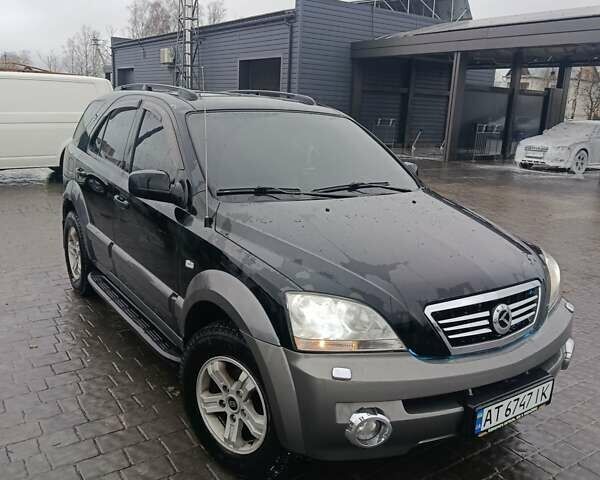 Черный Киа Соренто, объемом двигателя 2.5 л и пробегом 302 тыс. км за 6900 $, фото 7 на Automoto.ua