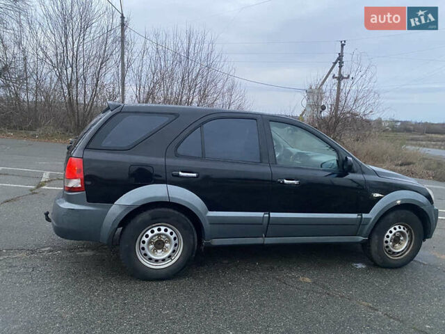 Черный Киа Соренто, объемом двигателя 2.5 л и пробегом 250 тыс. км за 4150 $, фото 8 на Automoto.ua