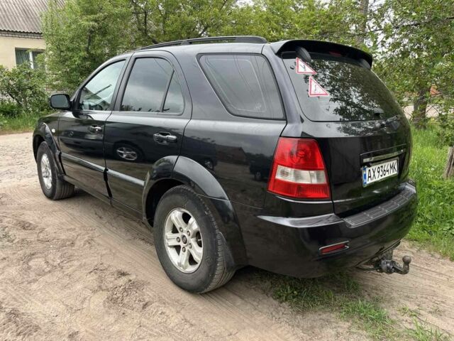 Черный Киа Соренто, объемом двигателя 2.5 л и пробегом 260 тыс. км за 6500 $, фото 7 на Automoto.ua