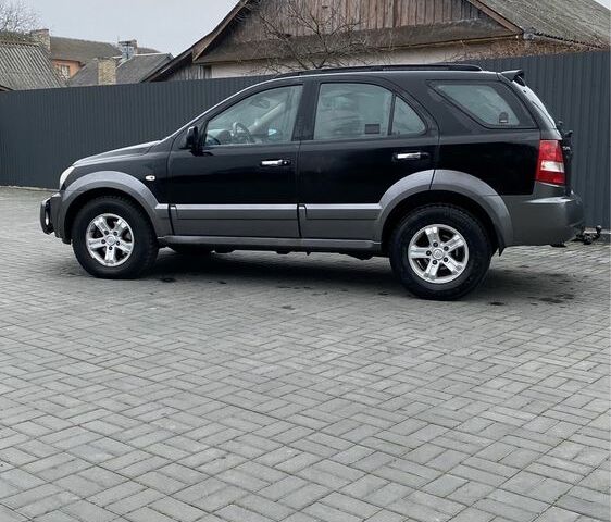 Черный Киа Соренто, объемом двигателя 2.5 л и пробегом 278 тыс. км за 2800 $, фото 4 на Automoto.ua