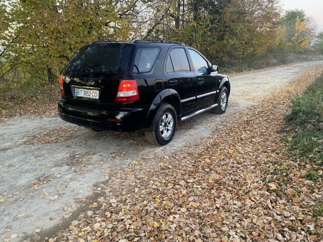 Черный Киа Соренто, объемом двигателя 2.5 л и пробегом 200 тыс. км за 7100 $, фото 3 на Automoto.ua