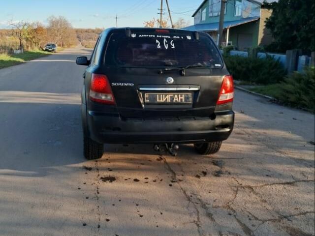 Черный Киа Соренто, объемом двигателя 2.5 л и пробегом 310 тыс. км за 3800 $, фото 3 на Automoto.ua