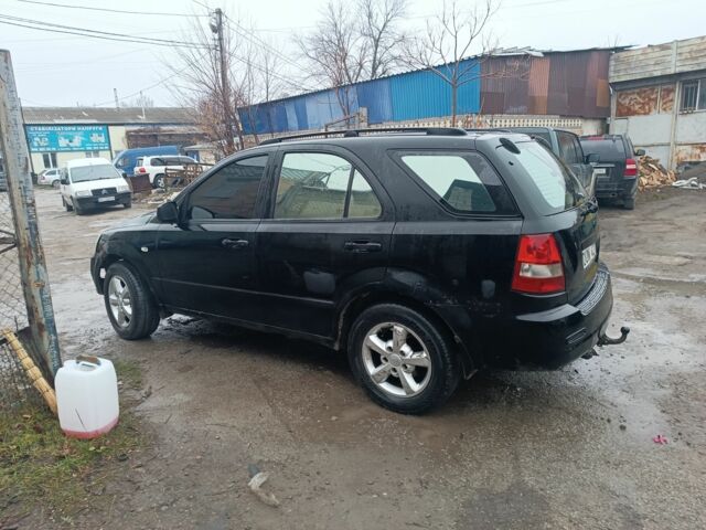 Черный Киа Соренто, объемом двигателя 2.5 л и пробегом 123 тыс. км за 2450 $, фото 1 на Automoto.ua